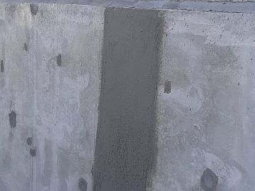 Выровненная бетонная поверхность, устранили локальные дефекты (трещины, каверны) раствором Стармекс РМ3